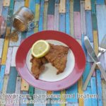 Schnitzel würzen, panieren und braten